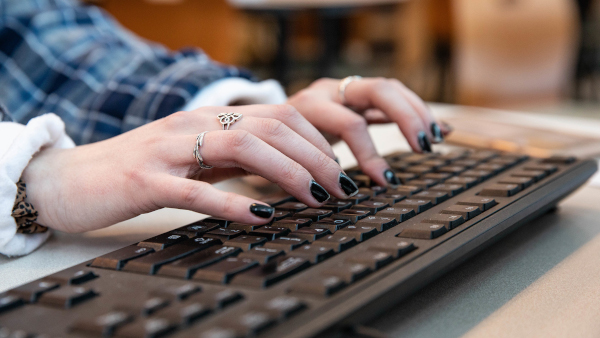 hands on a keyboard